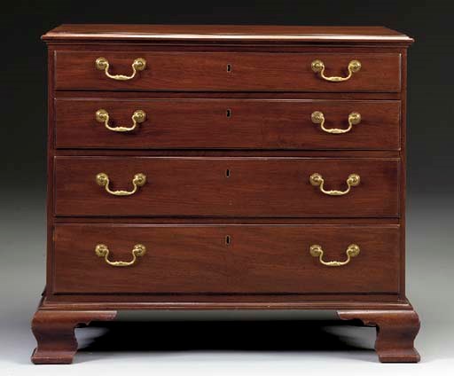 A CHIPPENDALE MAHOGANY CHEST-OF-DRAWERS