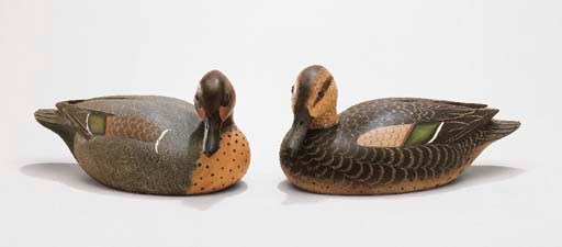 A GREENWING TEAL HEN AND DRAKE