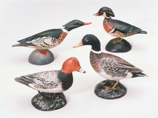 A GROUP OF FOUR MINIATURE DECORATIVES
