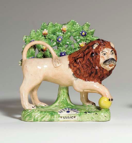 A STAFFORDSHIRE CREAMWARE MODEL OF 'WALLACE'