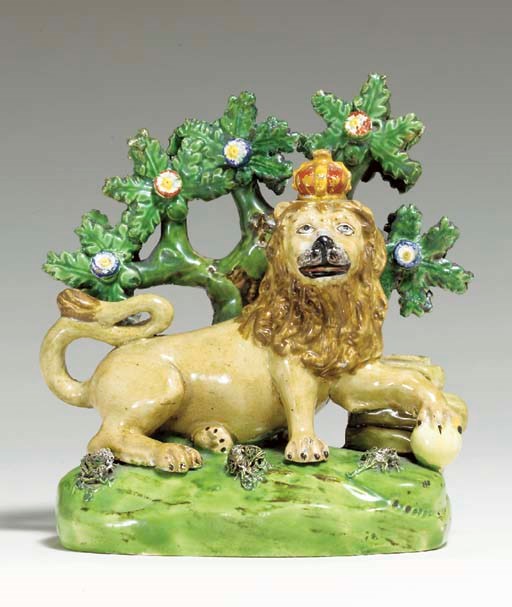 A WALTON PEARLWARE MODEL OF A LION EMBLEMATIC OF ENGLAND