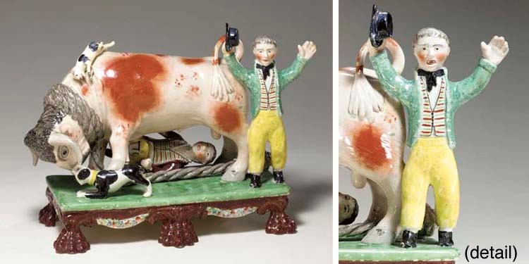 A STAFFORDSHIRE PEARLWARE FIGURE GROUP OF BULL-BAITING