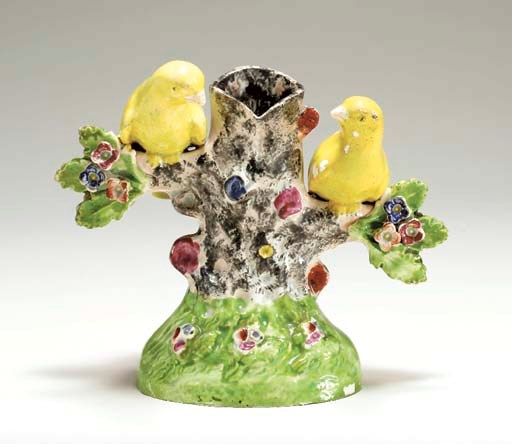 A STAFFORDSHIRE PEARLWARE NESTING-BIRD SPILL VASE
