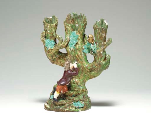 A STAFFORDSHIRE PEARLWARE NESTING-BIRD SPILL VASE