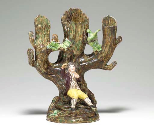 A STAFFORDSHIRE PEARLWARE NESTING-BIRD SPILL VASE