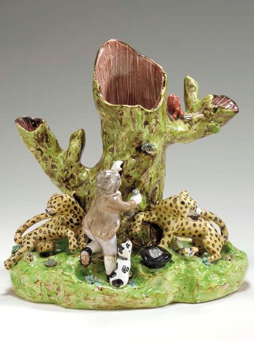A STAFFORDSHIRE PEARLWARE NESTING-BIRD SPILL VASE