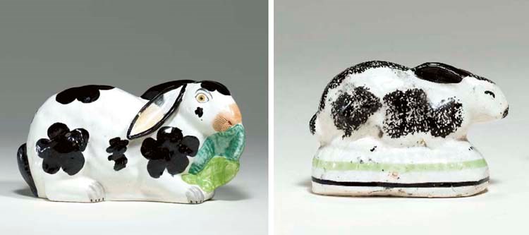 TWO STAFFORDSHIRE MODELS OF CROUCHING RABBITS