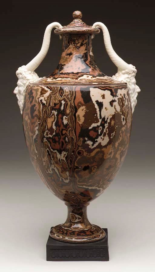 A WEDGWOOD AND BENTLEY WHITE TERRACOTTA STONEWARE TWO-HANDLED VASE AND COVER