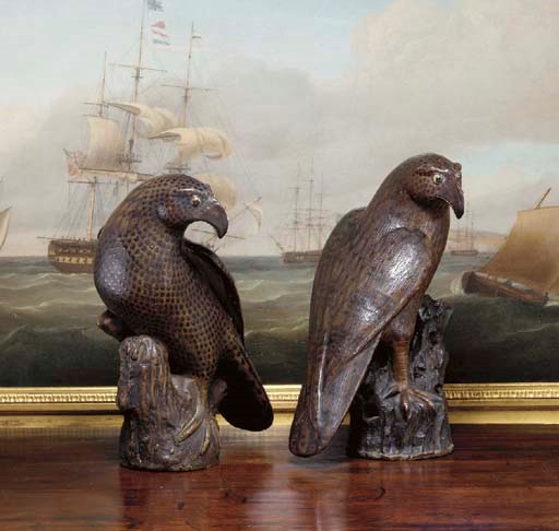 A PAIR OF BROWN HAWKS
