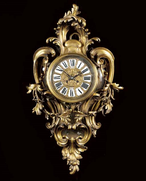 A Louis XV style ormolu cartel d'applique,