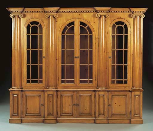 A GEORGE III STYLE PINE BOOKCASE,