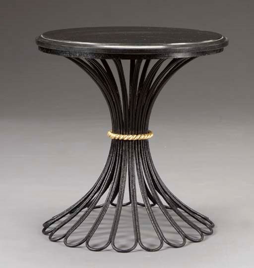 A BLACK-PAINTED AND PARCEL-GILT METAL CENTER TABLE,