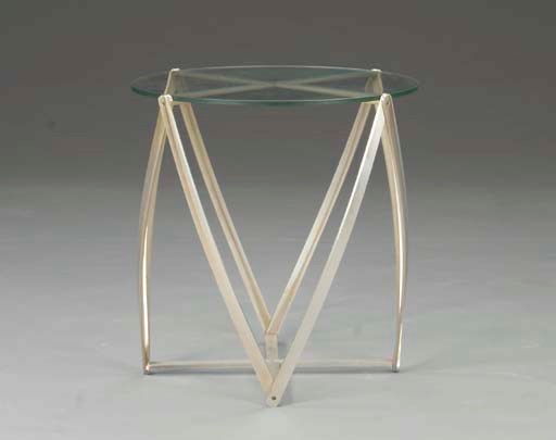 A CLEAR GLASS AND NICKLE SIDE TABLE,