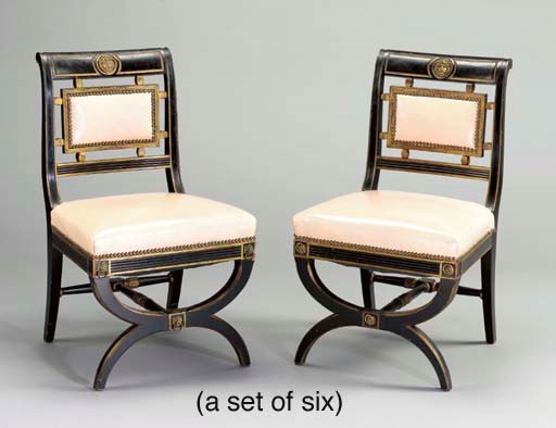 A SET OF SIX REGENCY STYLE EBONIZED AND PARCEL-GILT DINING CHAIRS,