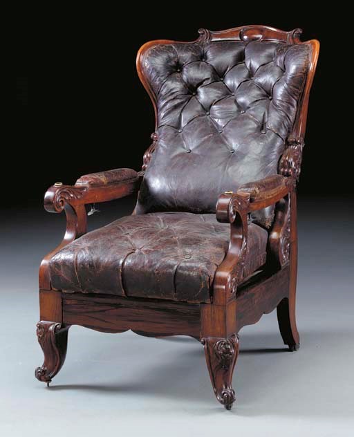 A VICTORIAN GRAINED AND ROSEWOOD RECLINING ARMCHAIR,