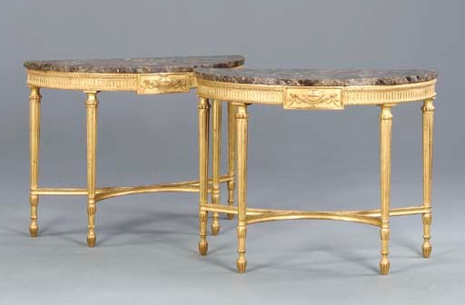 A PAIR OF GEORGE III STYLE GILTWOOD DEMI-LUNE CONSOLE TABLES,