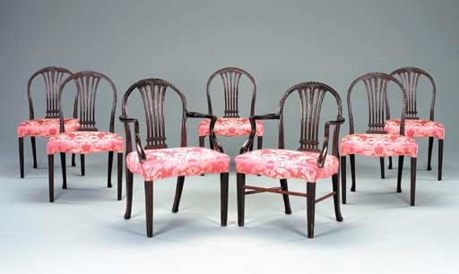 A SET OF SEVEN MAHOGANY DINING CHAIRS,