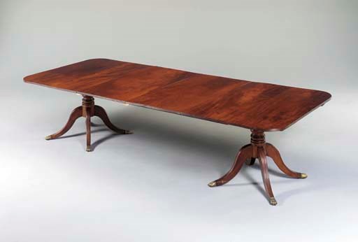 A GEORGE IV MAHOGANY TWIN-PEDESTAL MAHOGANY DINING TABLE,