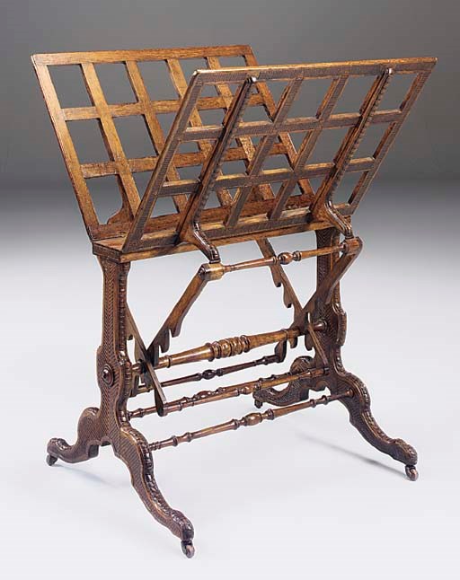 A Victorian carved oak folio stand