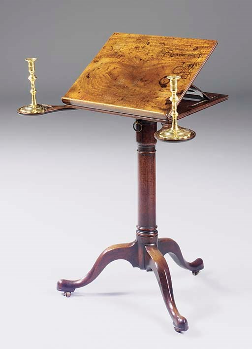 A GEORGE III MAHOGANY READING-TABLE