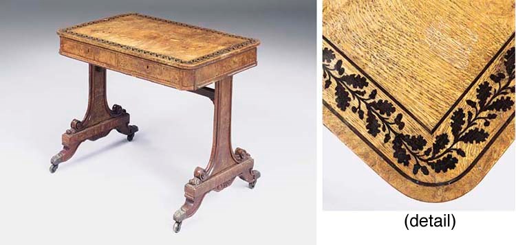 A REGENCY EBONY-INLAID BROWN OAK WRITING-TABLE