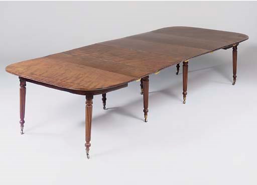 A REGENCY MAHOGANY EXTENDING DINING-TABLE