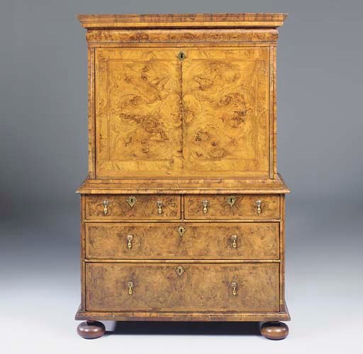 A QUEEN ANNE FIGURED-WALNUT ESCRITOIRE