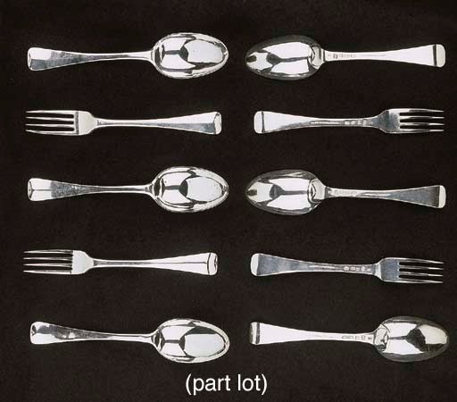 A case with twelve Dutch silver table forks and spoons