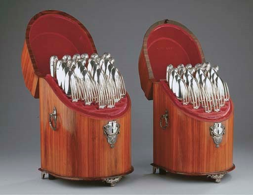 Two satin wood boxes containing Dutch silver cutlery