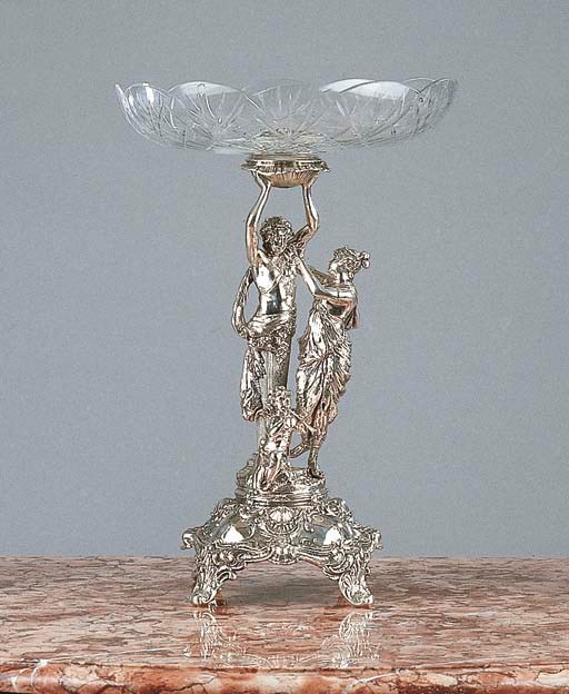 A large cut-glass fruit dish on silver foot