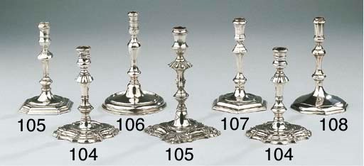 Two English George II silver tapersticks