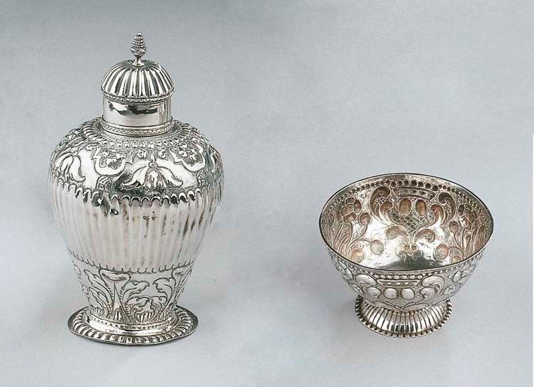 A Dutch silver teacaddy and a cream bowl