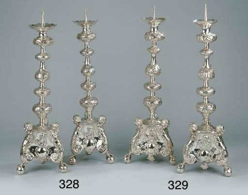 A pair of Dutch silver pricket candlesticks