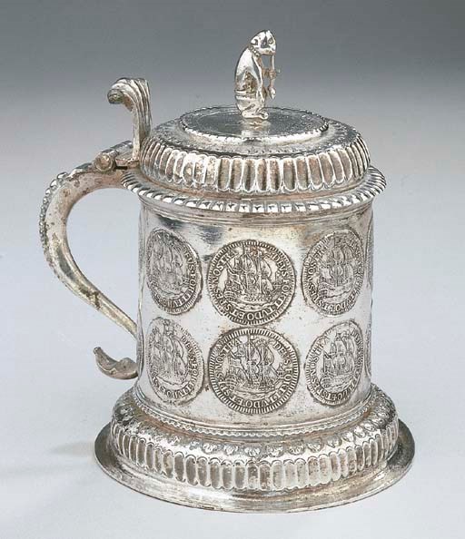 A Dutch silver coin tankard