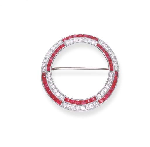 AN ART DECO RUBY AND DIAMOND CIRCLE BROOCH
