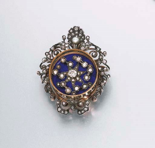AN ANTIQUE DIAMOND AND BLUE ENAMEL MECHANICAL BROOCH, BY C MARCKS & CO.