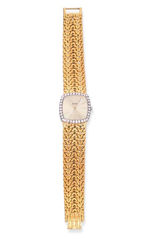 A DIAMOND AND GOLD BRACELET WATCH, BY PIAGET