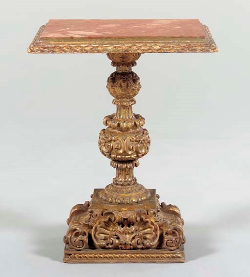 AN ITALIAN BAROQUE STYLE GILTWOOD CENTER TABLE,