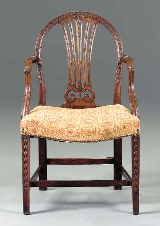 A GEORGE III PROVINCIAL MAHOGANY ARMCHAIR,