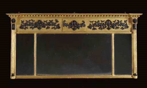 A REGENCY GILTWOOD AND PARCEL-EBONIZED COMPOSITION OVERMANTEL MIRROR,