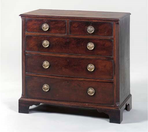 A GEORGE III PROVINCIAL MAHOGANY CHEST-OF-DRAWERS,