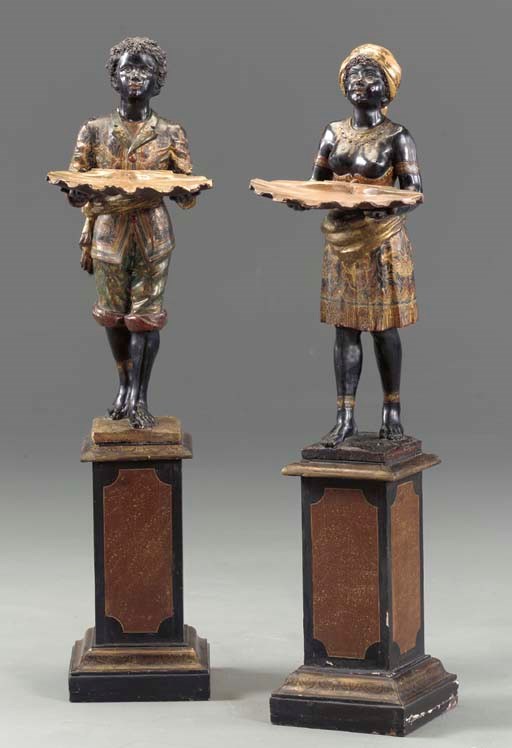A PAIR OF VENETIAN POLYCHROME-DECORATED BLACKAMOOR STANDS,