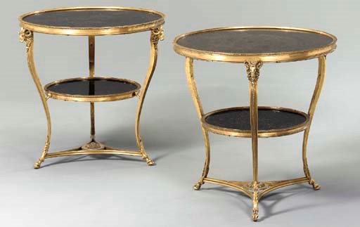 A PAIR OF ORMOLU AND BLACK MARBLE GUERIDONS,