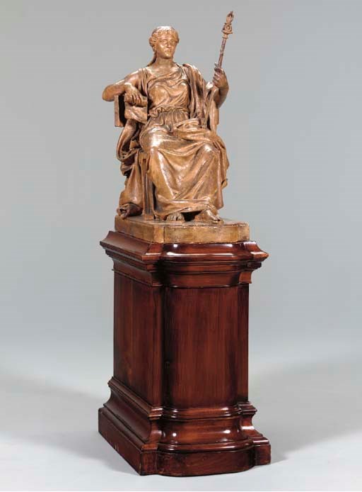 A FRENCH TINTED-PLASTER FIGURE OF LIBERTY ON A MAHOGANY PEDESTAL,