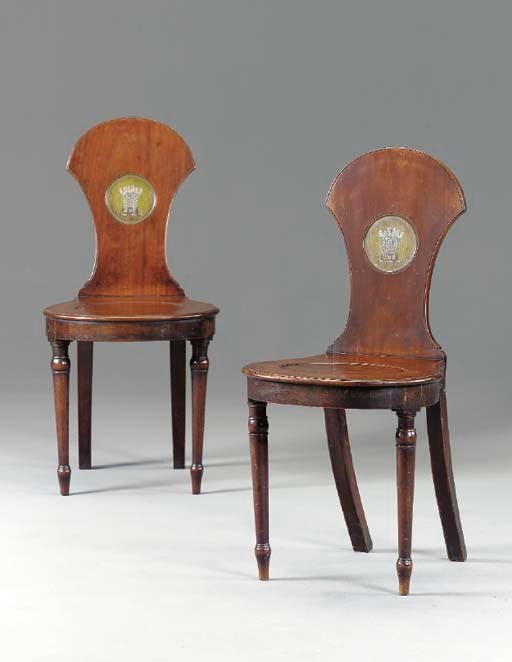 A PAIR OF GEORGE III MAHOGANY HALL CHAIRS,