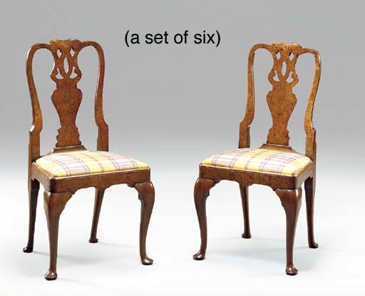 A SET OF SIX GEORGE I STYLE WALNUT SIDE CHAIRS,