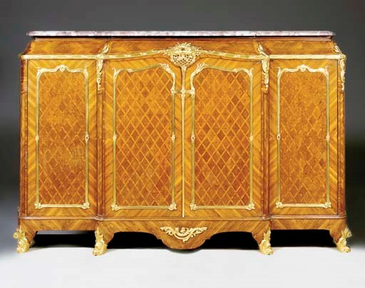 A French ormolu-mounted kingwood, tulipwood and parquetry cabinet
