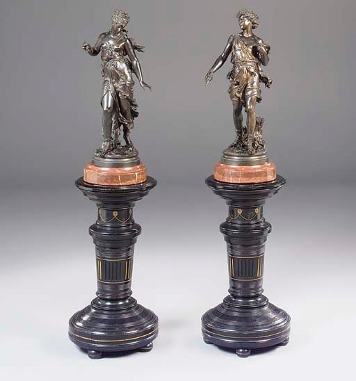 A pair of French patinated-bronze Classical figures, on ebonised pedestals