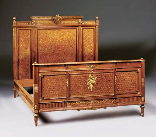 A French ormolu-mounted parquetry bed