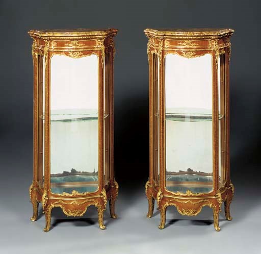 A pair of French ormolu-mounted kingwood vitrines